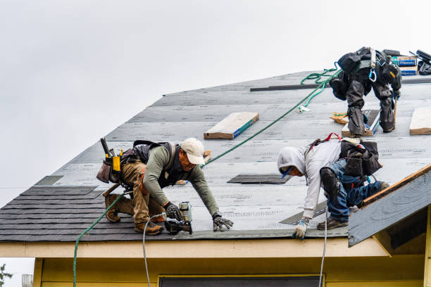 Professional Roofing technician working in Tolovana Park, OR